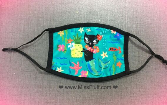 Cute purrmaid kitty face masks designed by artist Miss Fluff! 