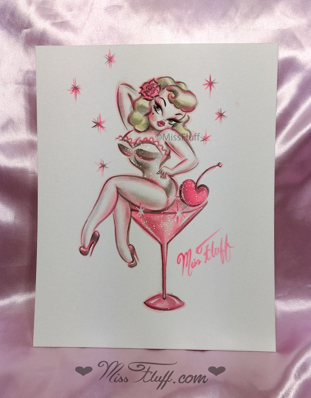 retro rockabilly style blonde on a pink martini